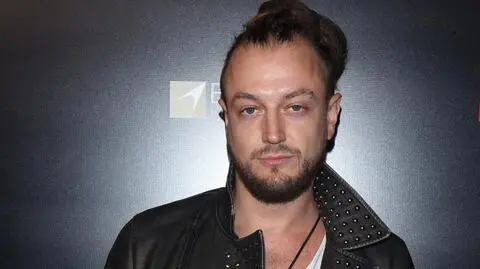 Aleksander Milwiw-Baron na zdjęciu z synkiem