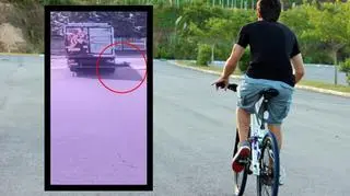 nastolatek jedzie na rowerze, potrącony chłopiec wychodzi spod ciężarówki