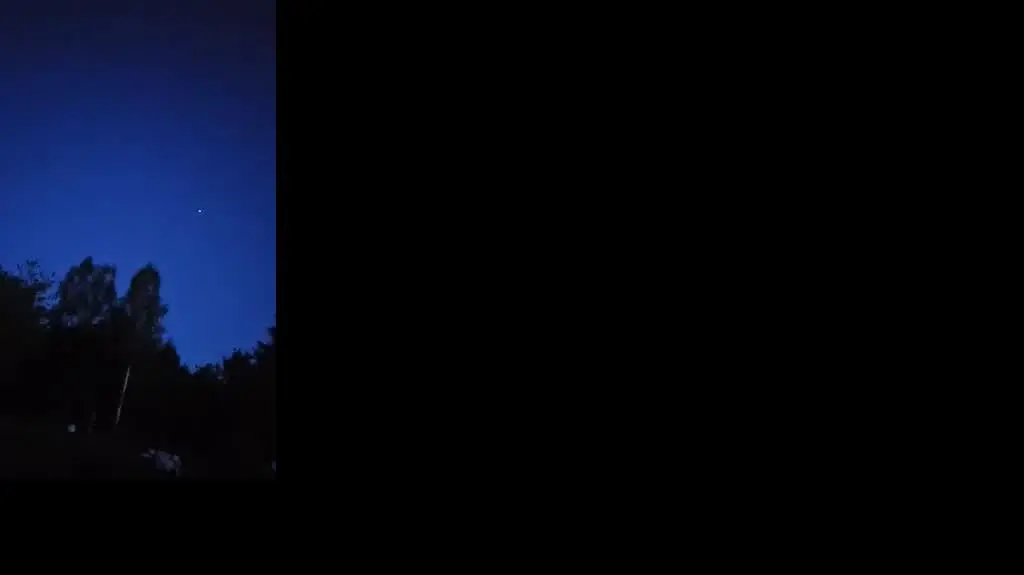 ISS widoczna na tle tarczy Księżyca