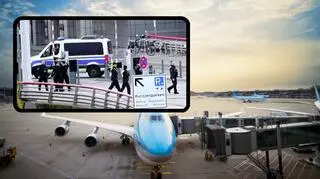 Uzbrojony mężczyzna na płycie lotniska