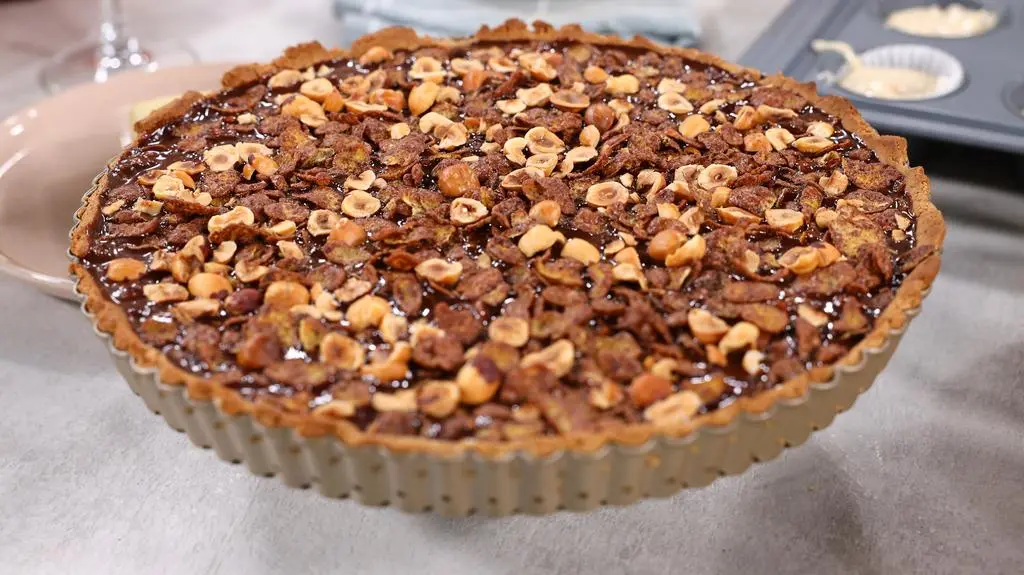 Tarta z mlecznej czekolady z malinami 