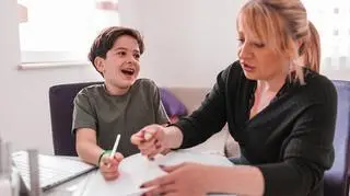 Dziecko z korepetytorem