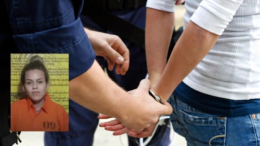 Kobieta zakuta w kajdanki